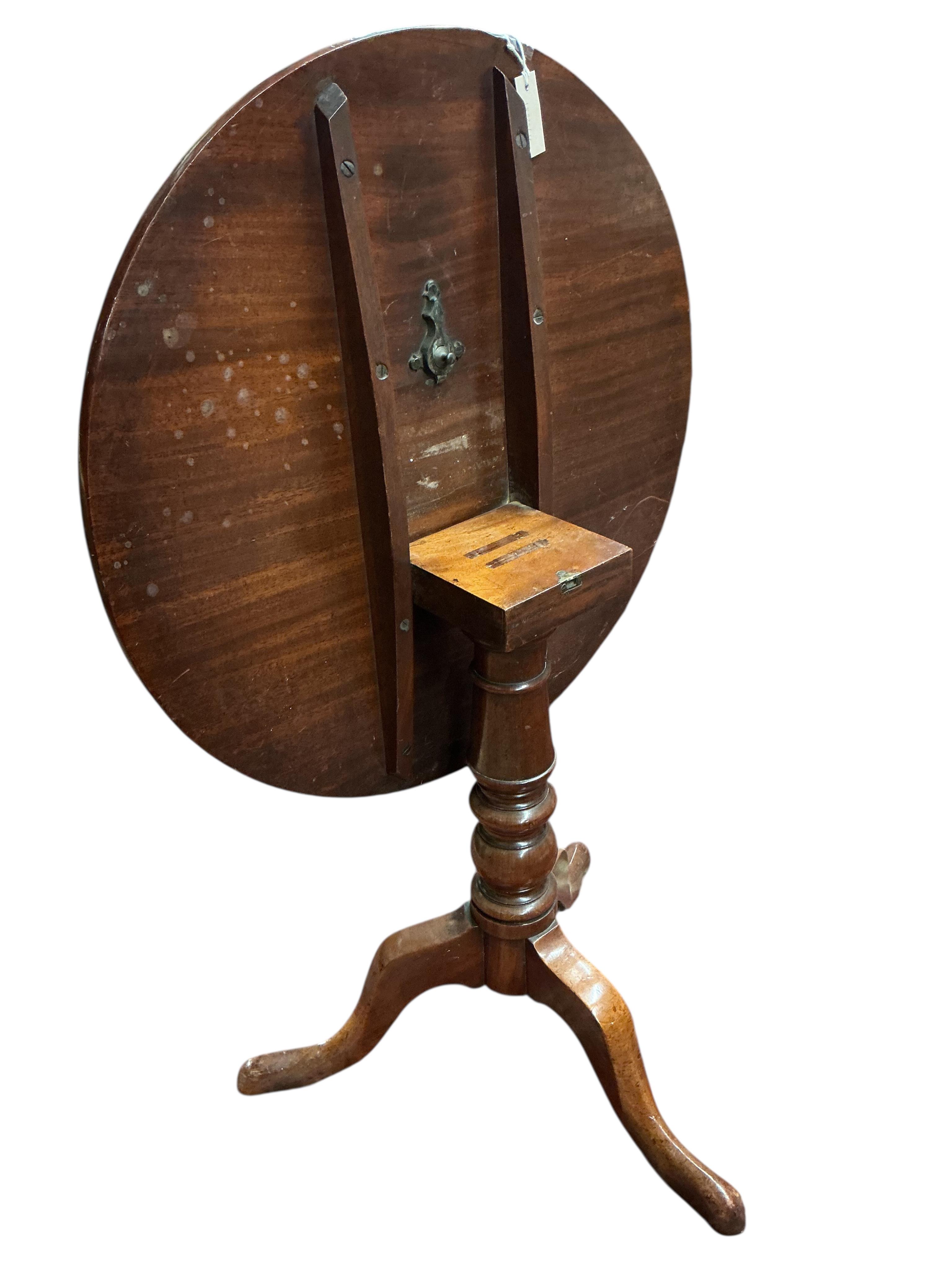 A Victorian mahogany circular tilt top tripod tea table, diameter 76cm, height 73cm